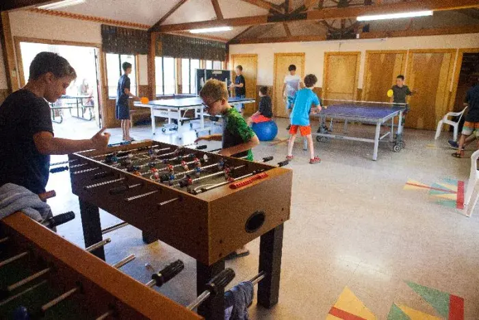 Campers playing foosball