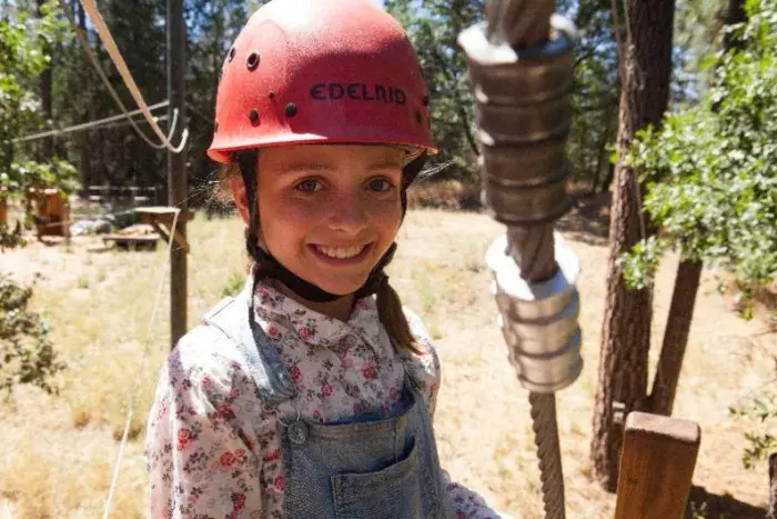 Happy camper on ropes course